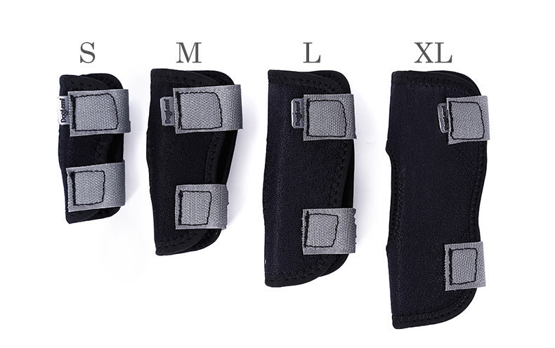 Set of four black protective pads in different sizes on a white background