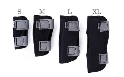Set of four black protective pads in different sizes on a white background
