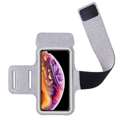 Silver phone armband with a smartphone displaying a colorful screen on a white background
