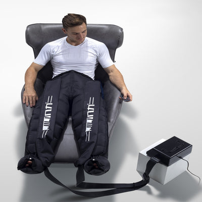 Person using a massage chair with attachments on a white background
