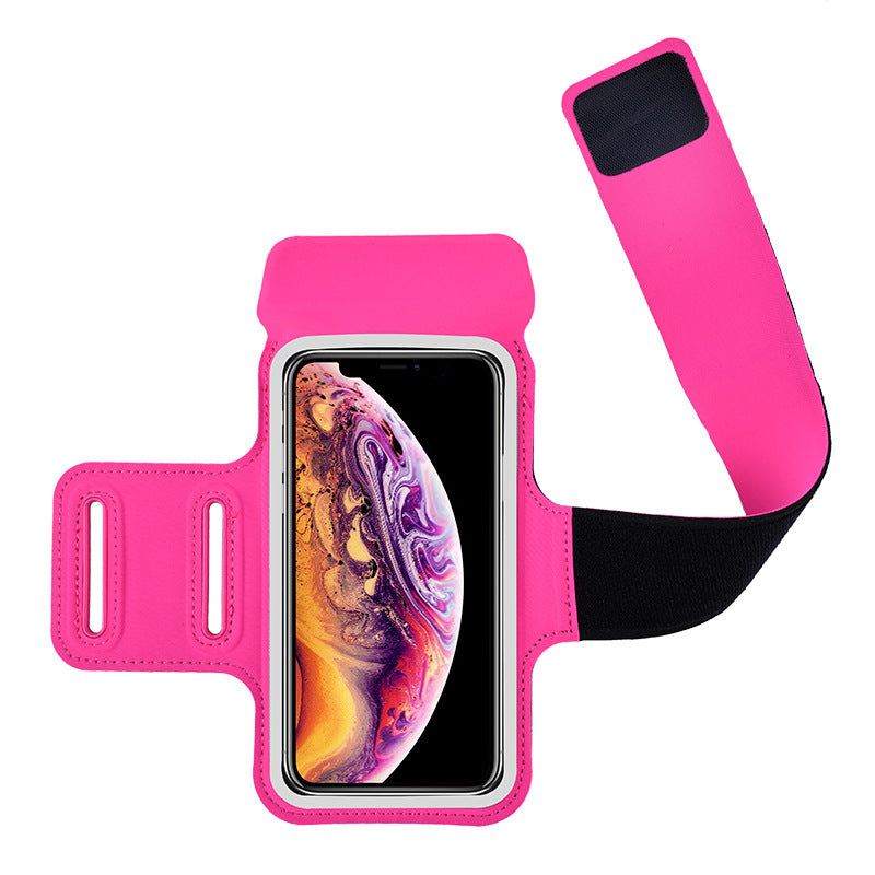 Pink phone armband with a smartphone displaying a colorful screen on a white background